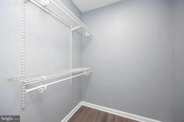 a view of a room with racks on the wall