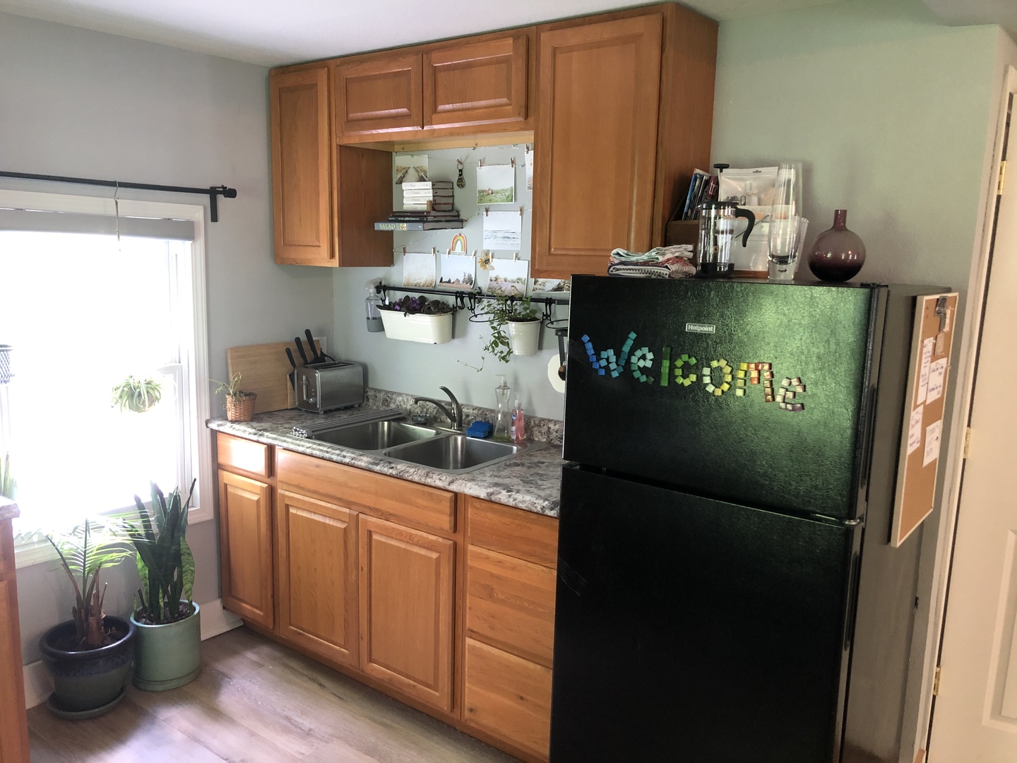 1011 West Church Street Champaign, IL 61821 - Photo 13 of 20 a kitchen with stainless steel appliances granite countertop a refrigerator and a stove