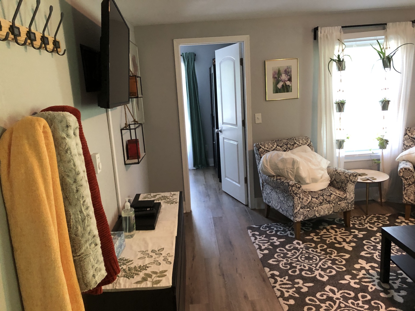 1011 West Church Street Champaign, IL 61821 - Photo 8 of 20 a living room with furniture and a flat screen tv