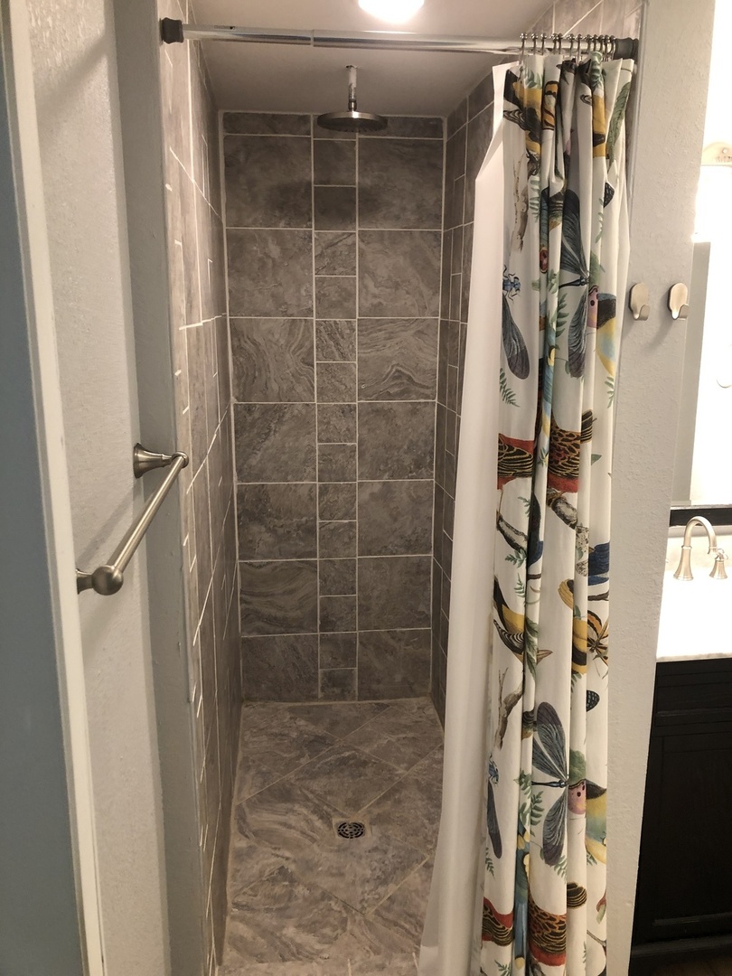 1011 West Church Street Champaign, IL 61821 - Photo 9 of 20 a bathroom with a shower and a glass door