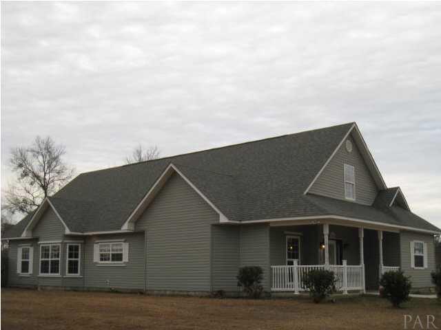 2095 Well Line Road Cantonment, FL 32533 - Photo 2 of 20 Side veiw of home.