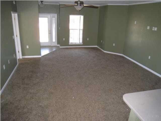 2095 Well Line Road Cantonment, FL 32533 - Photo 10 of 20 From kitchn looking into the living room towards the Front Door. The master bedroom is to the left.