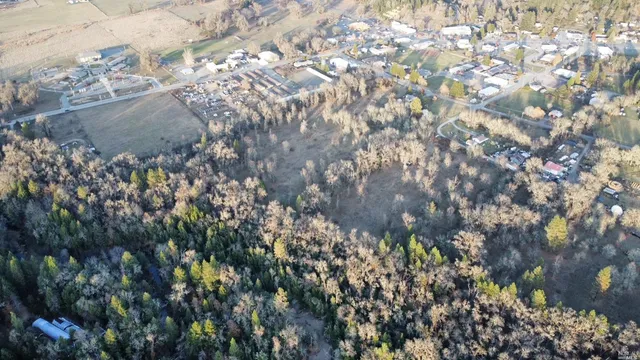 a view of a lake with trees