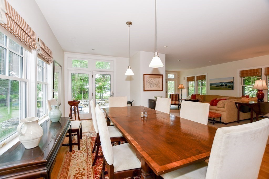 594 Point Road Marion, MA 02738 - Photo 15 of 37 a view of a dining room with furniture window and outside view