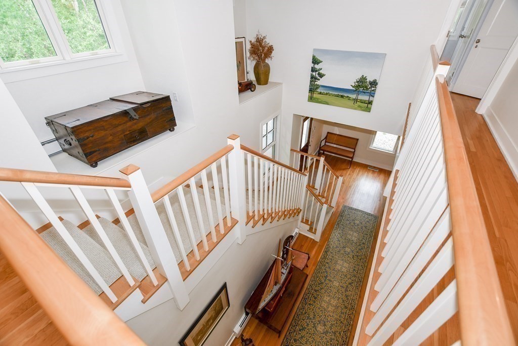 594 Point Road Marion, MA 02738 - Photo 22 of 37 a view of an entryway with furniture and wooden floor