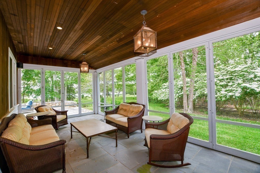 594 Point Road Marion, MA 02738 - Photo 33 of 37 a living room with furniture and a large window