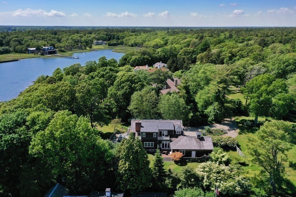 594 Point Road Marion, MA 02738 - Photo 35 of 37 an aerial view of a house with a yard and lake view