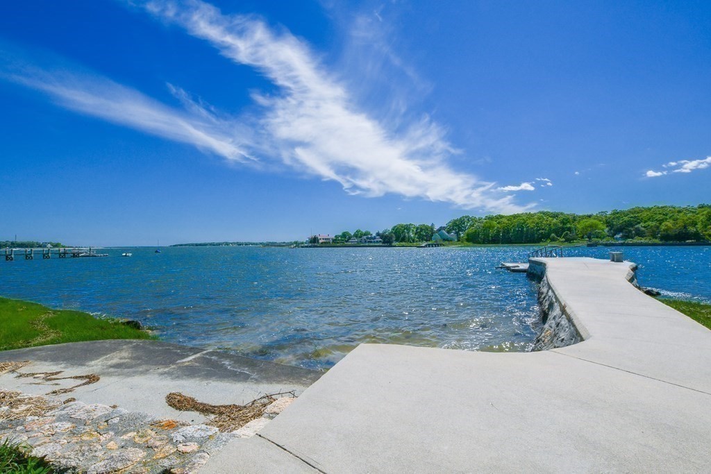 594 Point Road Marion, MA 02738 - Photo 7 of 37 a view of a lake from a yard