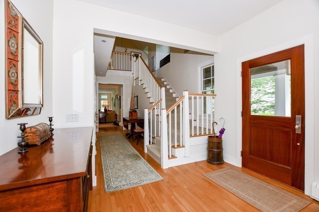 594 Point Road Marion, MA 02738 - Photo 10 of 37 a view of a livingroom with furniture and staircase