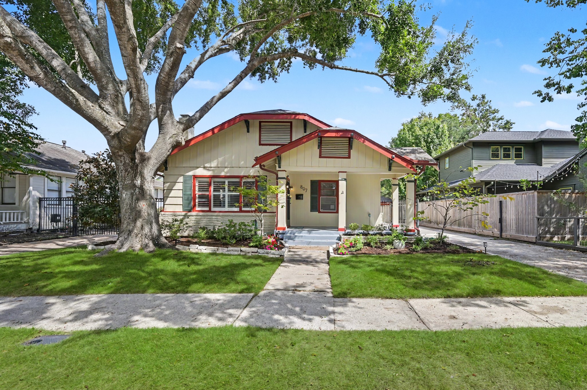 807 Key Street Houston, TX 77009 - Photo 1 of 27 Charming Heights bungalow framed by a mature shade tree, fresh landscaping, and a welcoming covered front porch.