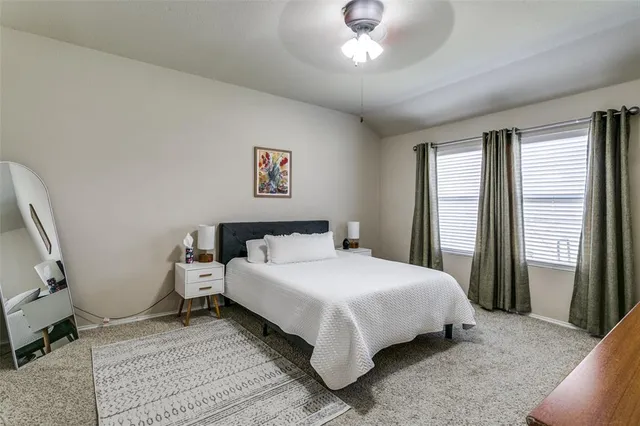 a kitchen with a sink stainless steel appliances and cabinets