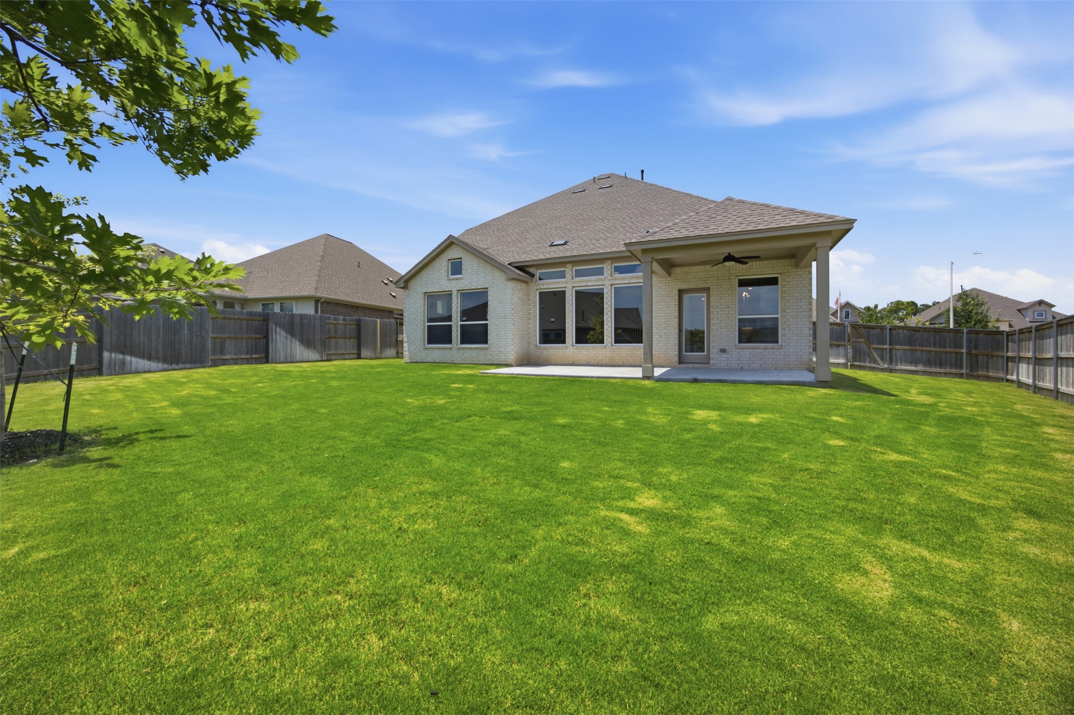 2101 Little Snake Way Georgetown, TX 78633 - Photo 36 of 37 A spacious, manicured backyard offers ample room for outdoor enjoyment and relaxation.
