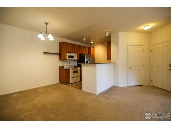 a view of a kitchen with a sink