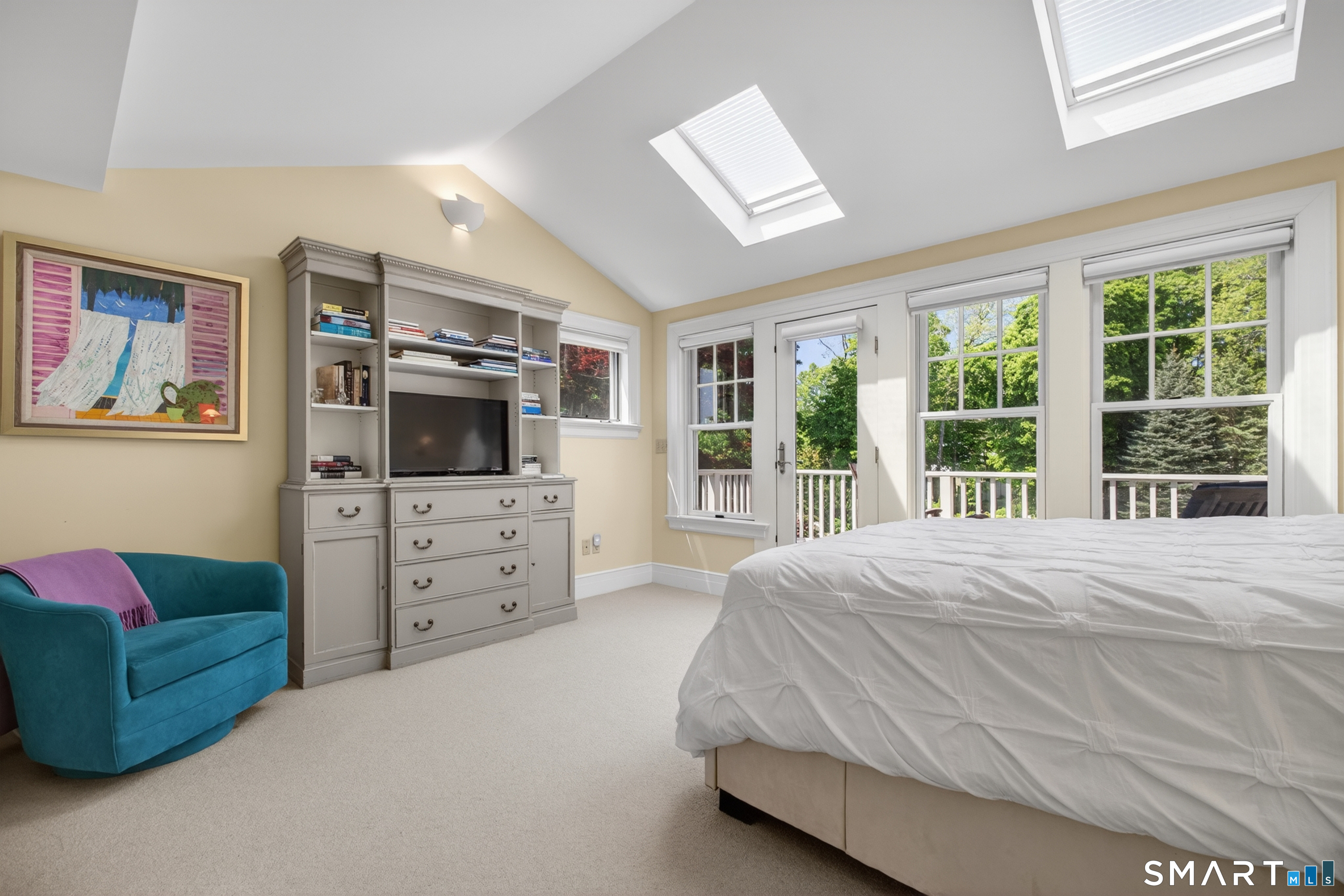 10 Prospect Street Groton, CT 06355 - Photo 29 of 40 a bedroom with a bed flat screen tv and a large window