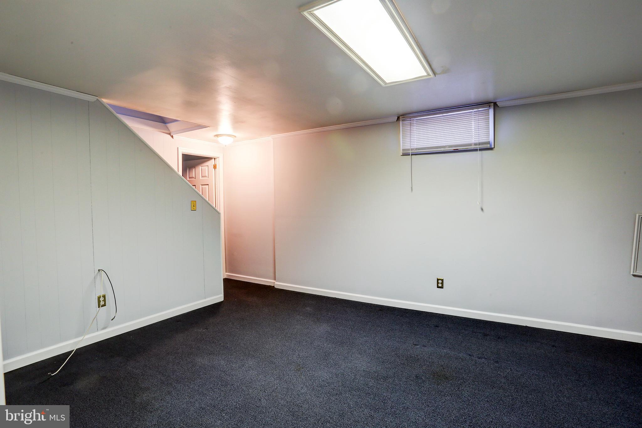 1201 Meadow View Road Pasadena, MD 21122 - Photo 20 of 34 Lower level family room