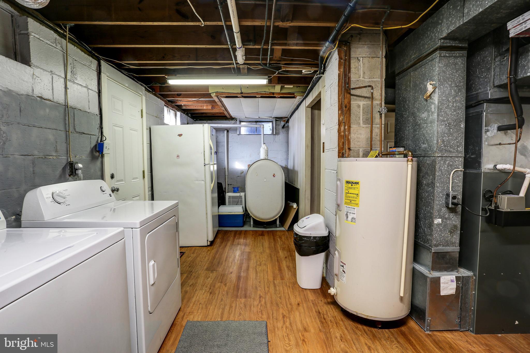 1201 Meadow View Road Pasadena, MD 21122 - Photo 25 of 34 Lower level washer, dryer and refrigerator.