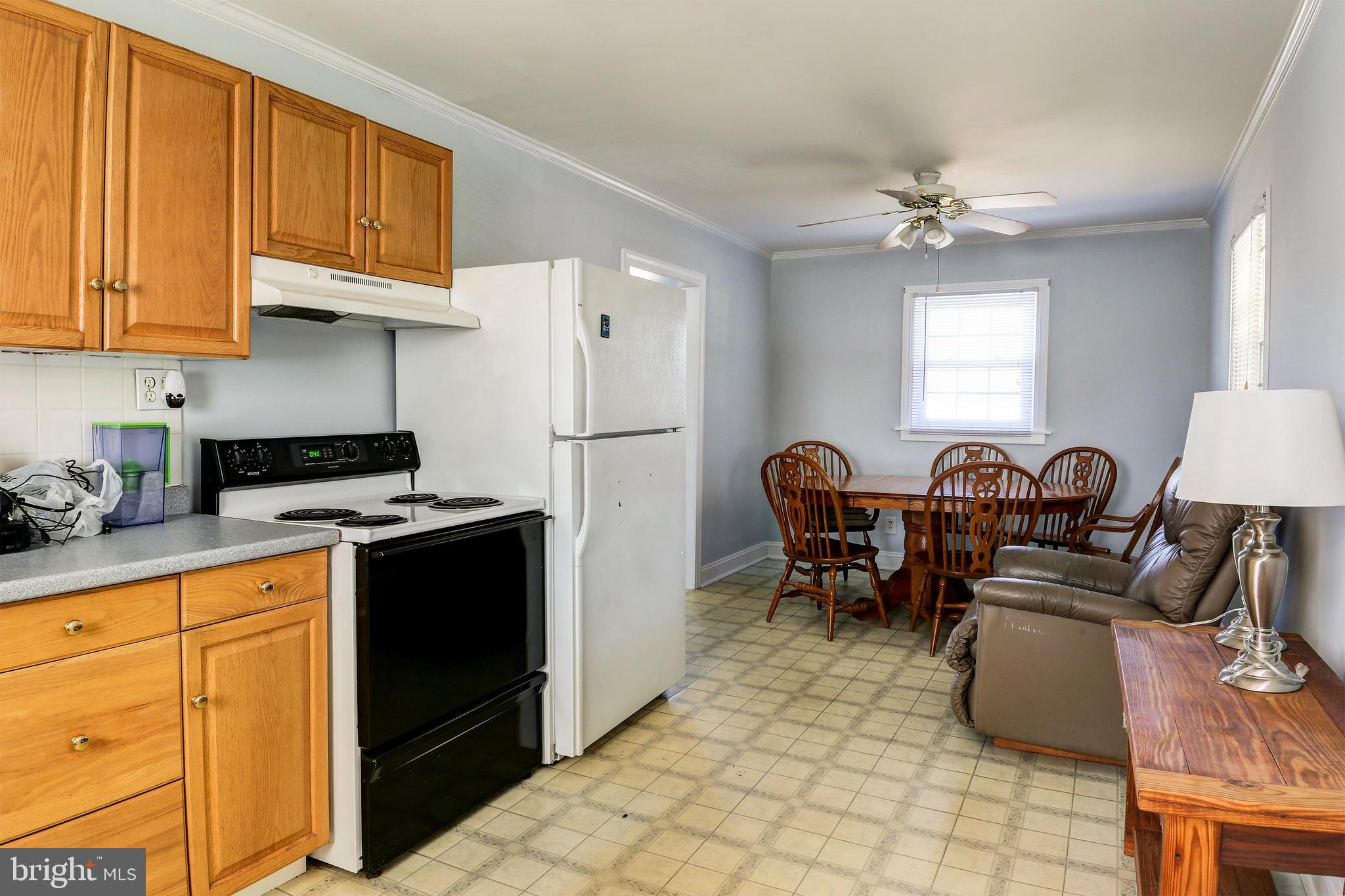 1201 Meadow View Road Pasadena, MD 21122 - Photo 7 of 34 Main level kitchen and dining room.