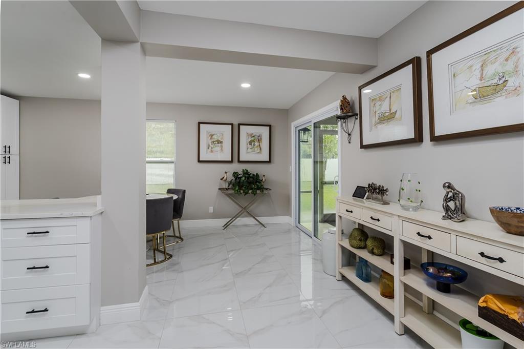 5170 19th Court Southwest Naples, FL 34116 - Photo 6 of 32 a view of a workspace with furniture