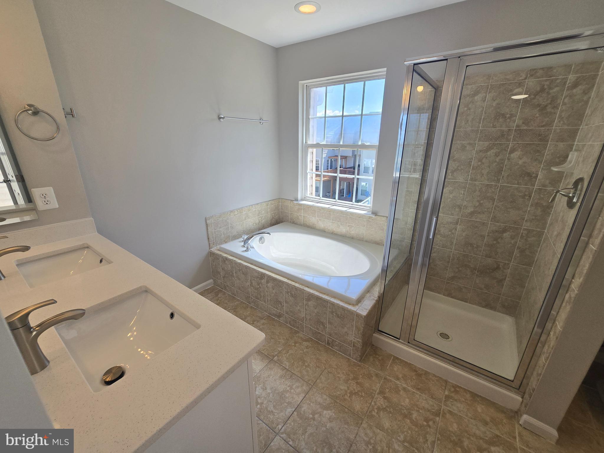 1248 Steed Street Ranson, WV 25438 - Photo 22 of 42 a bathroom with a sink and a tub