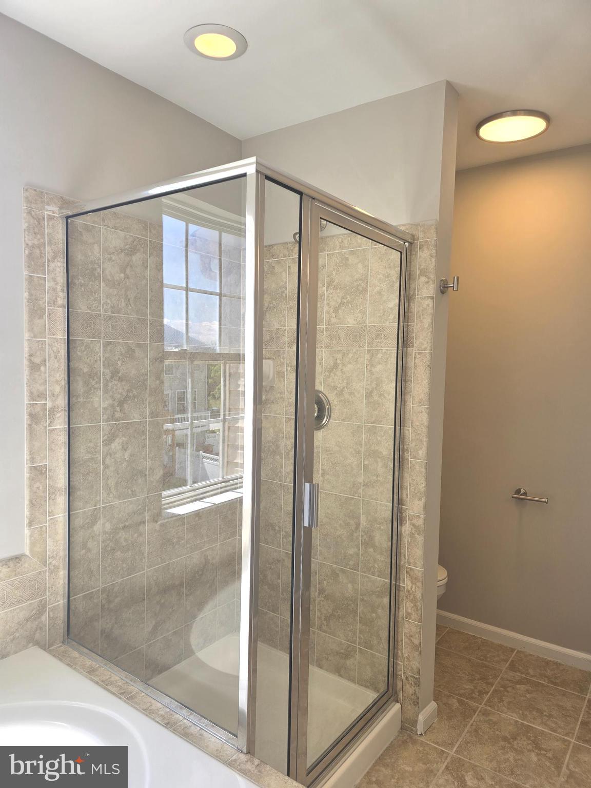 1248 Steed Street Ranson, WV 25438 - Photo 23 of 42 a bathroom with a shower