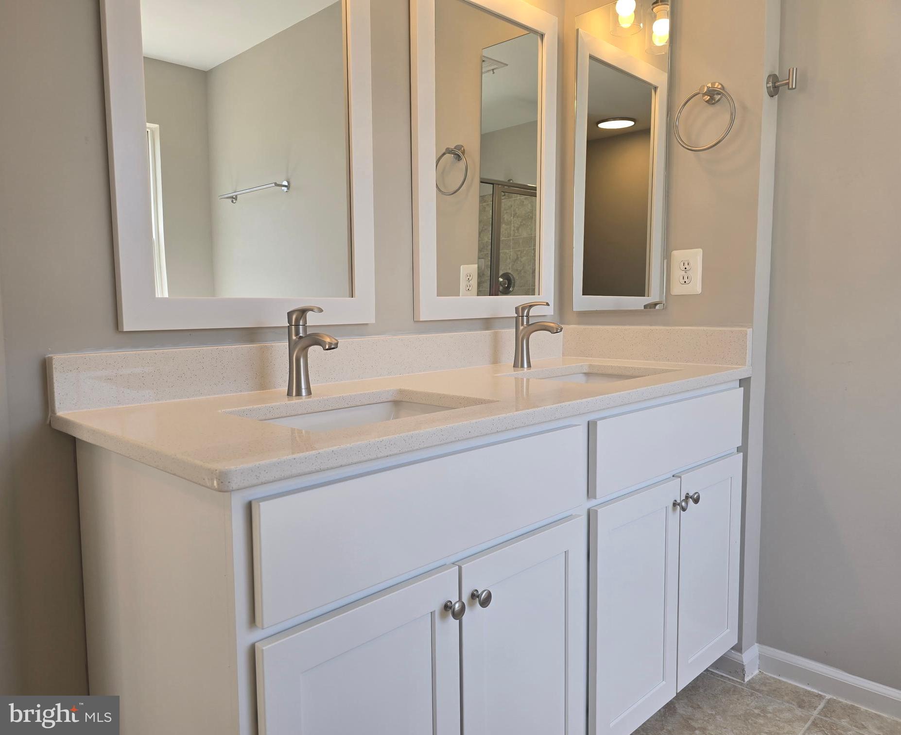 1248 Steed Street Ranson, WV 25438 - Photo 25 of 42 a bathroom with a sink and a mirror