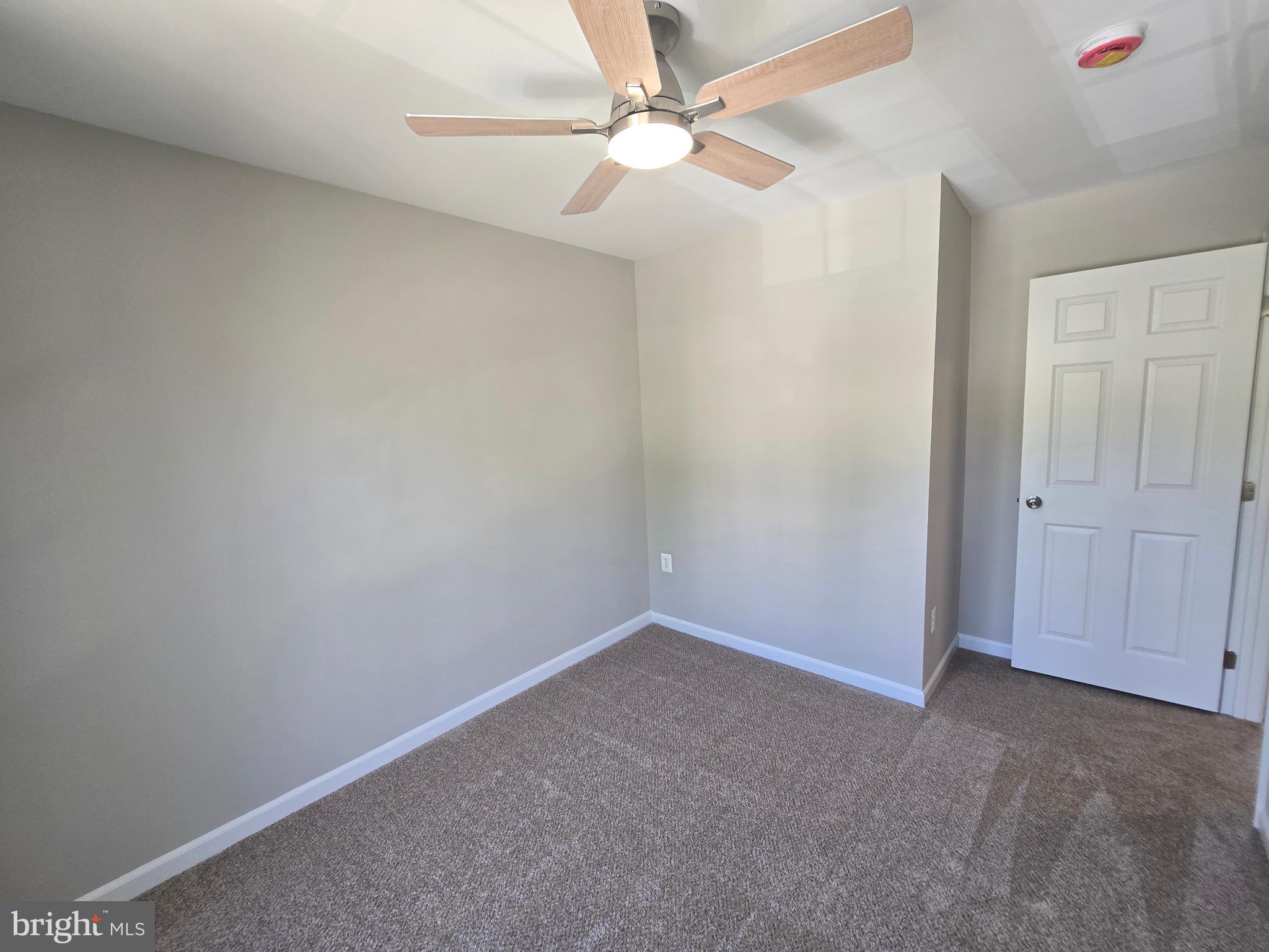 1248 Steed Street Ranson, WV 25438 - Photo 28 of 42 wooden floor in an empty room