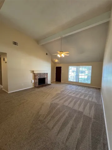 a view of a livingroom with a fireplace
