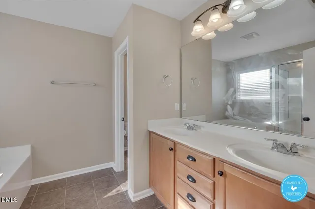 a bathroom with a sink a vanity and a mirror