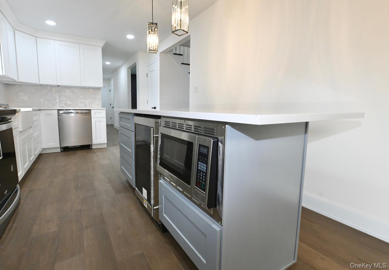 2 Little Hill East Setauket, NY 11733 - Photo 11 of 22 a view of a kitchen with electric appliances
