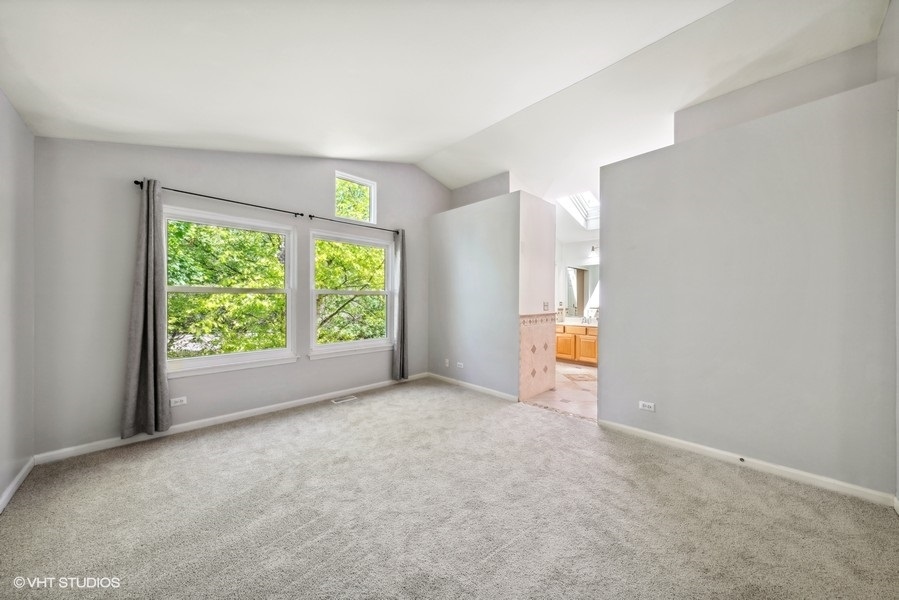 1824 Red Bud Road Bolingbrook, IL 60490 - Photo 11 of 22 a view of an empty room with a window