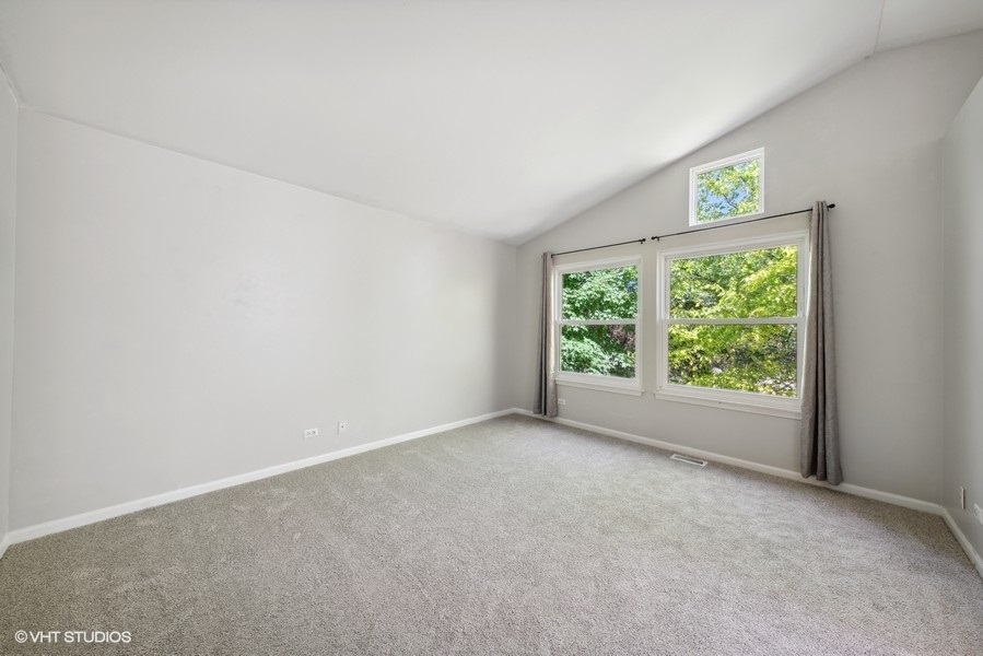 1824 Red Bud Road Bolingbrook, IL 60490 - Photo 12 of 22 a view of an empty room with a window