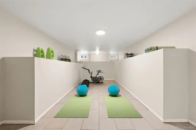 a view of a lush green hillside and houses
