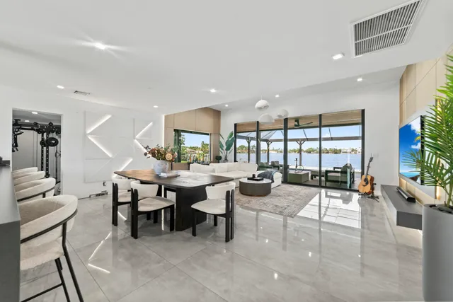 a living room with furniture and a table