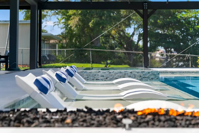 a view of a yard with furniture