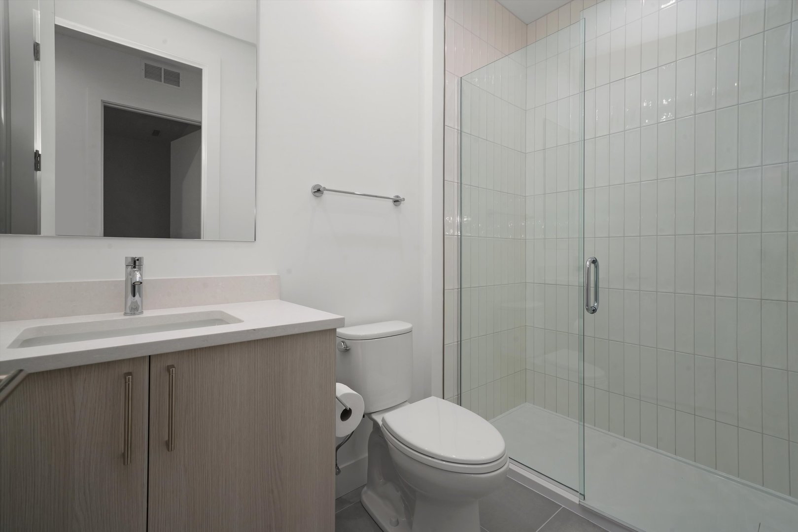 323 South Racine Avenue, Unit 3C Chicago, IL 60607 - Photo 14 of 18 a bathroom with a sink toilet and shower