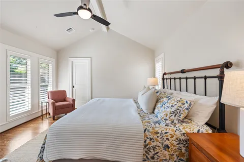 a spacious bathroom with a double vanity sink and a mirror