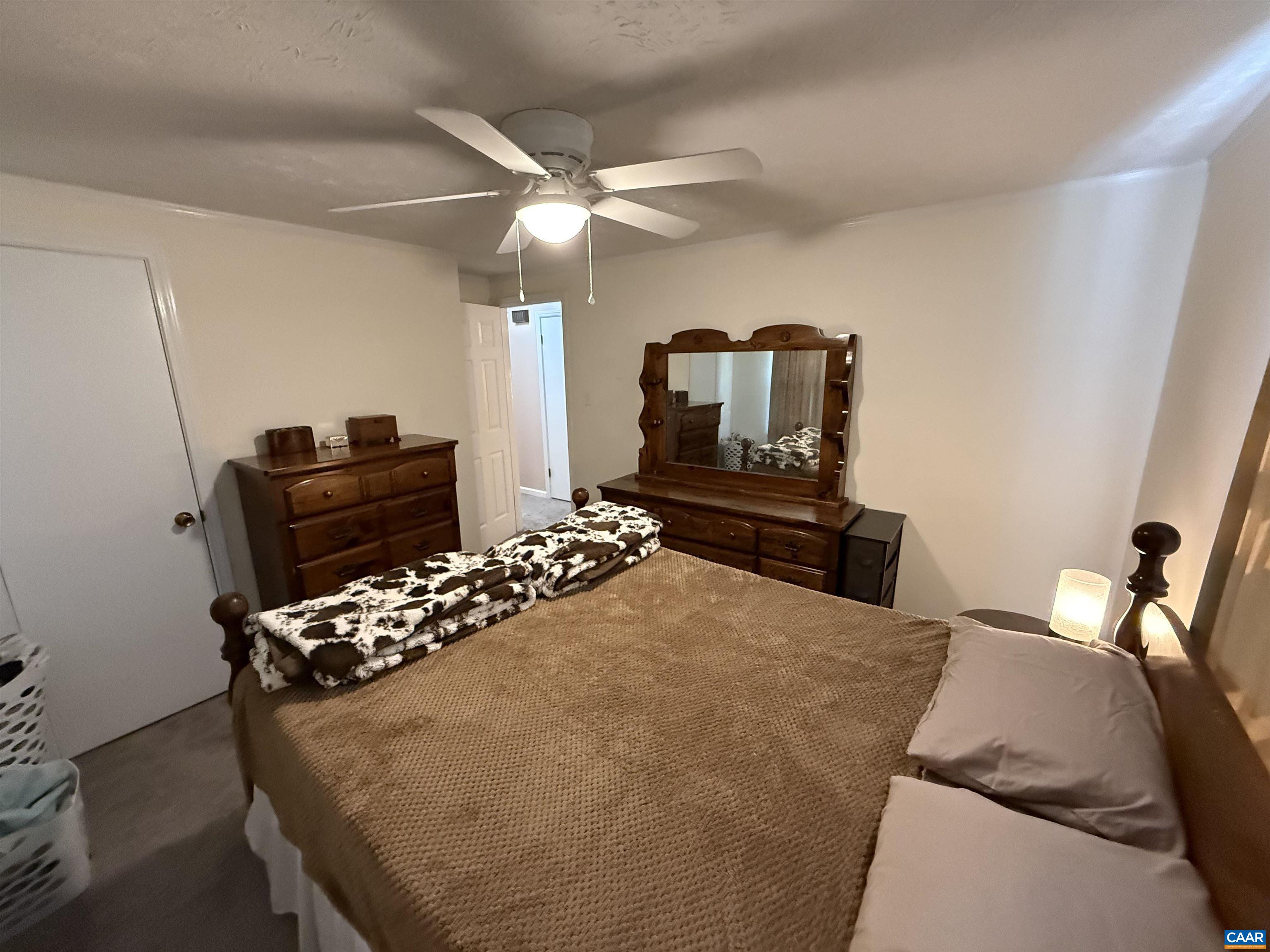2002 Oliver Creek Road Troy, VA 22974 - Photo 17 of 38 a bedroom with a bed and dresser