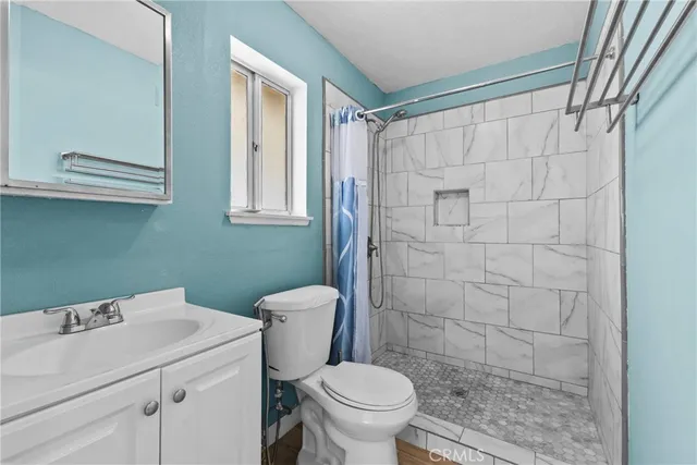 a bathroom with a sink and a toilet