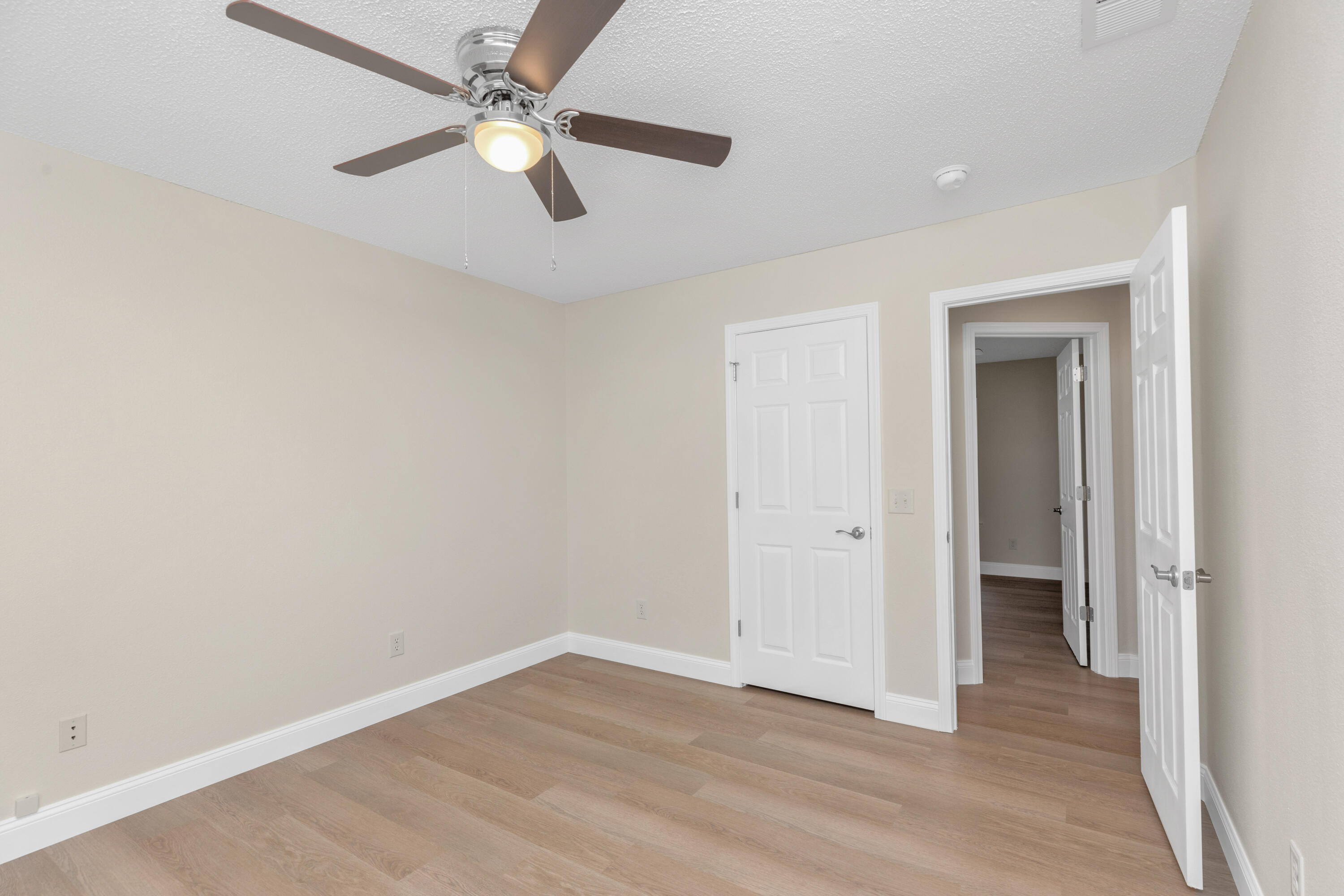 203 Riverchase Boulevard Crestview, FL 32536 - Photo 24 of 36 an empty room with fan and a ceiling fan
