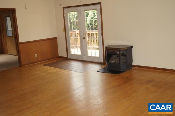 84 Wedgestone Road Stanardsville, VA 22973 - Photo 14 of 34 an empty room with windows