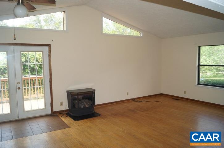 84 Wedgestone Road Stanardsville, VA 22973 - Photo 15 of 34 an empty room with windows