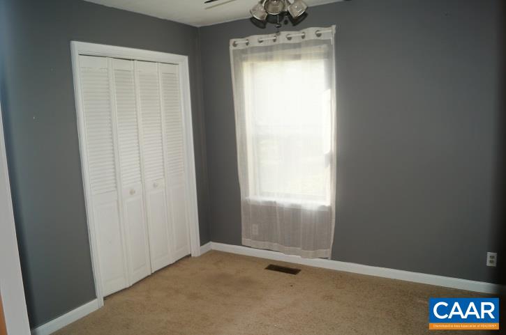84 Wedgestone Road Stanardsville, VA 22973 - Photo 23 of 34 an empty room with window