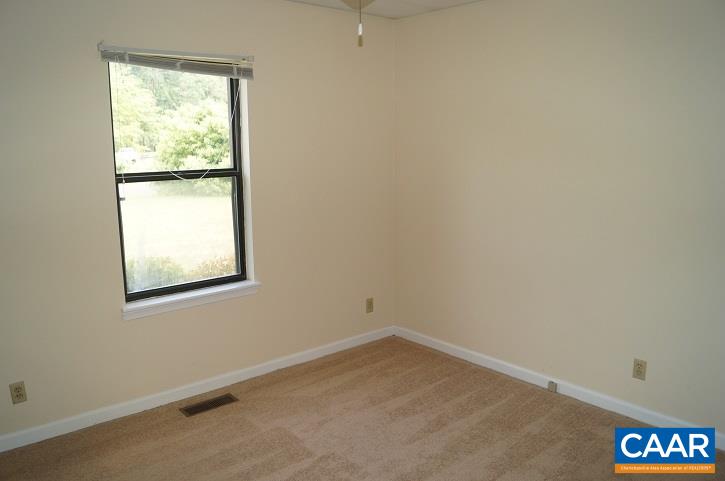 84 Wedgestone Road Stanardsville, VA 22973 - Photo 25 of 34 an empty room with a window