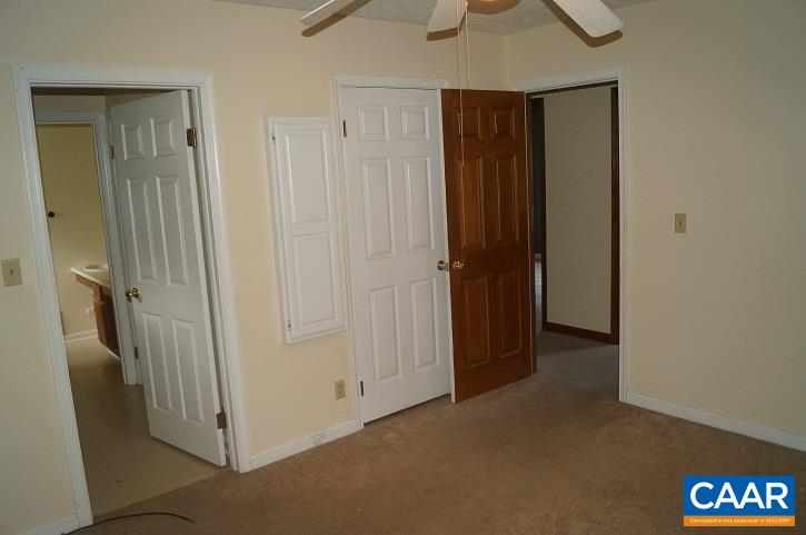 84 Wedgestone Road Stanardsville, VA 22973 - Photo 28 of 34 an empty room with windows