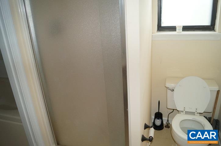 84 Wedgestone Road Stanardsville, VA 22973 - Photo 31 of 34 a bathroom with a toilet and a mirror
