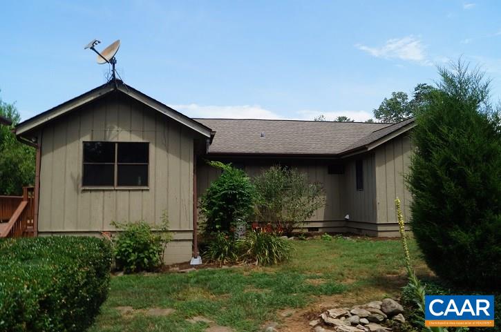 84 Wedgestone Road Stanardsville, VA 22973 - Photo 4 of 34 a backyard of a house with lots of green space