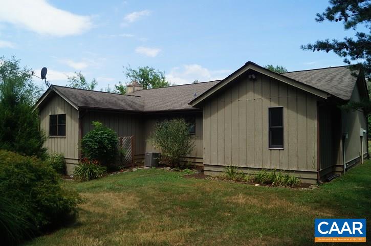84 Wedgestone Road Stanardsville, VA 22973 - Photo 5 of 34 a view of a house with a yard
