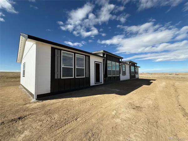 a view of house with outdoor space