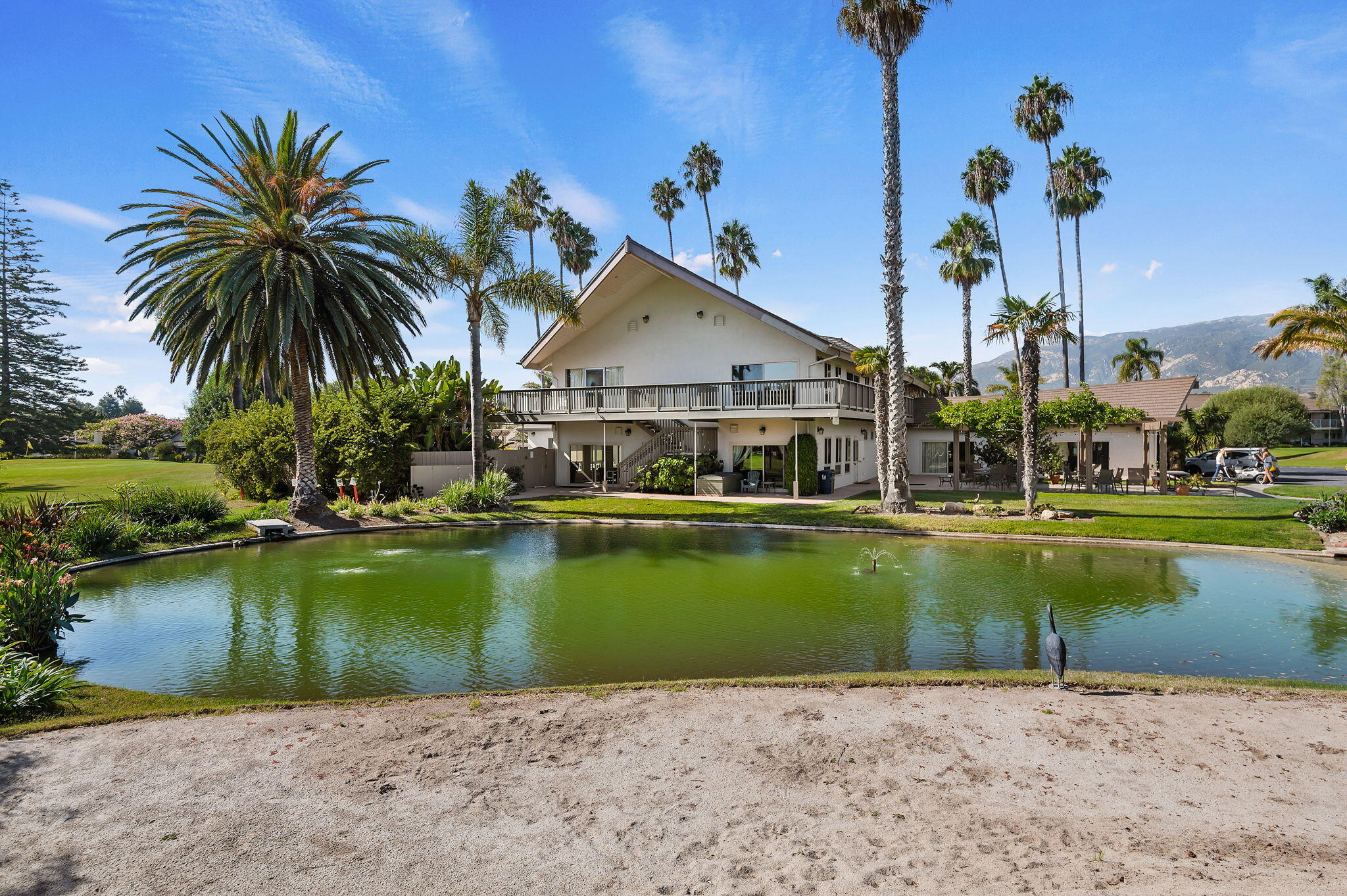 5796 Encina Road, Unit 2 Goleta, CA 93117 - Photo 21 of 38 Clubhouse and pond