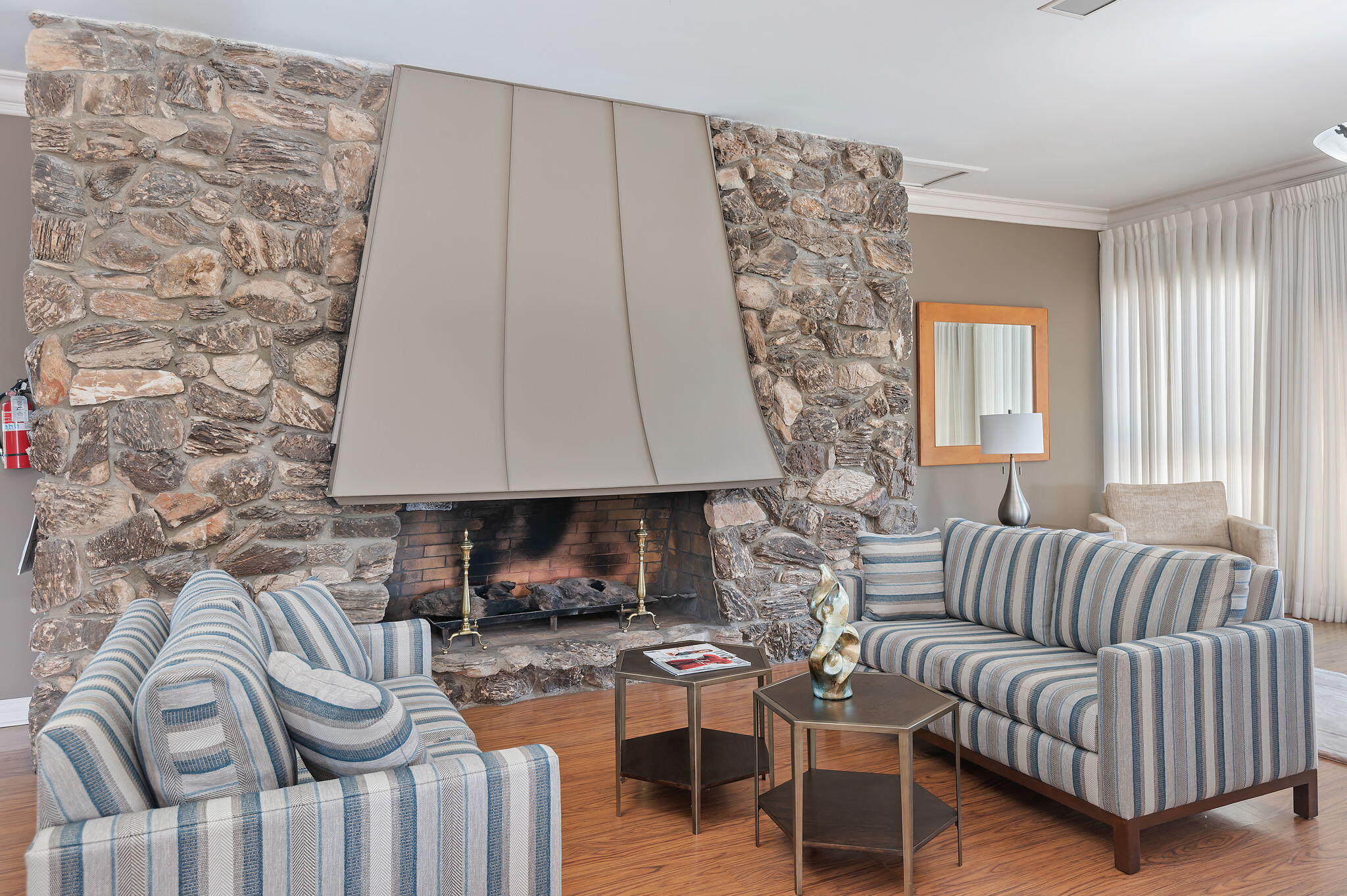 5796 Encina Road, Unit 2 Goleta, CA 93117 - Photo 26 of 38 Clubhouse lounge & fireplace